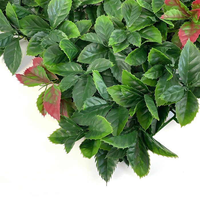 autumn artificial hedge tile with some red tipped faux leaves