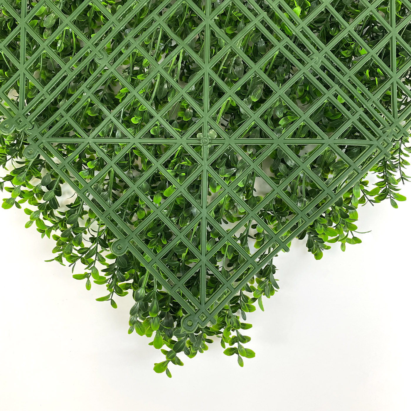 artificial boxwood flower reverse of tile