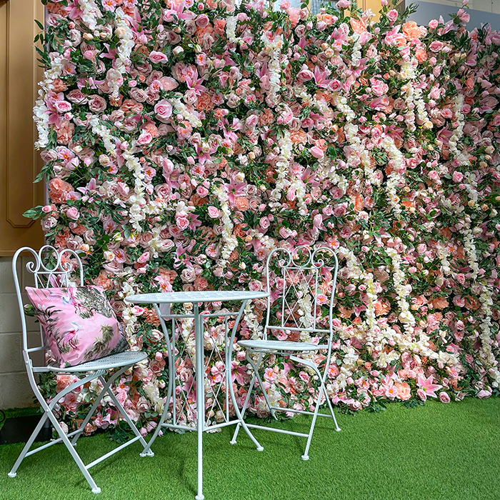 large artificial flower wall with silk flowers