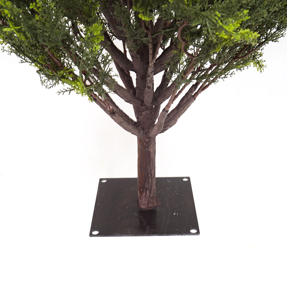 base of the outdoor artificial cypress trees