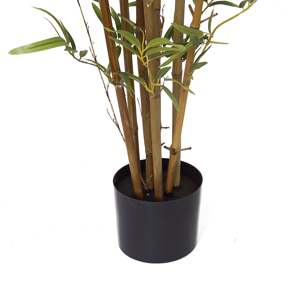 outdoor artificial bamboo plant potted in a black plastic pot