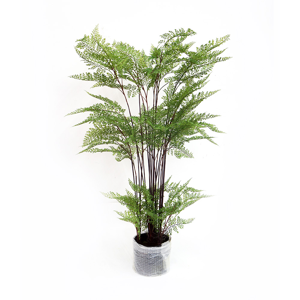 Indoor artificial fern in black plastic pot