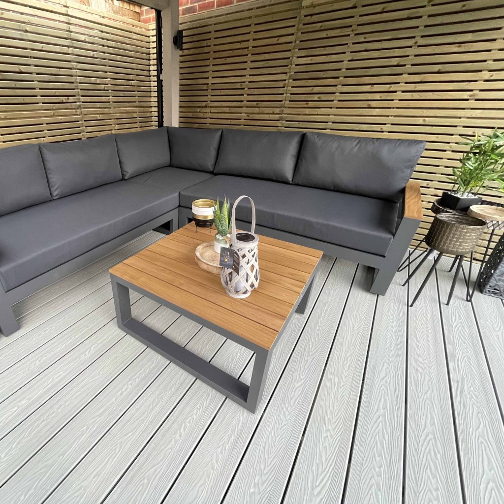 ash white composite decking installed in a modern garden