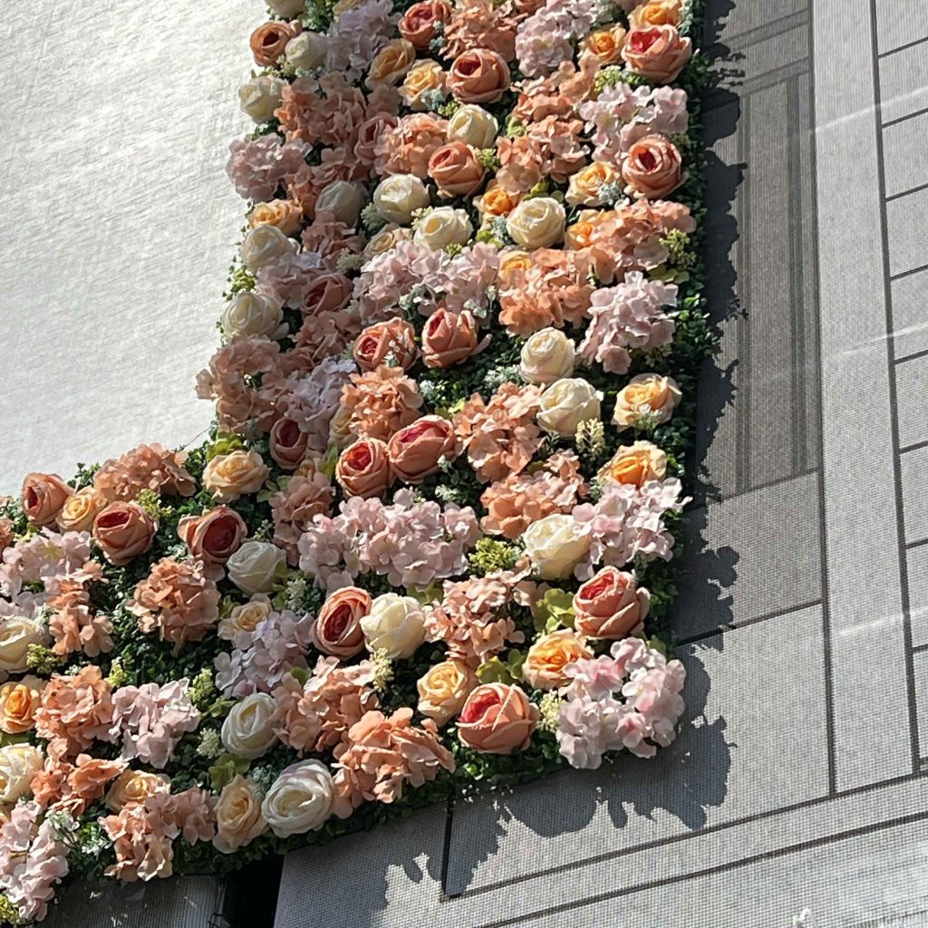 artificial flower tiles in soft peach and pink tones