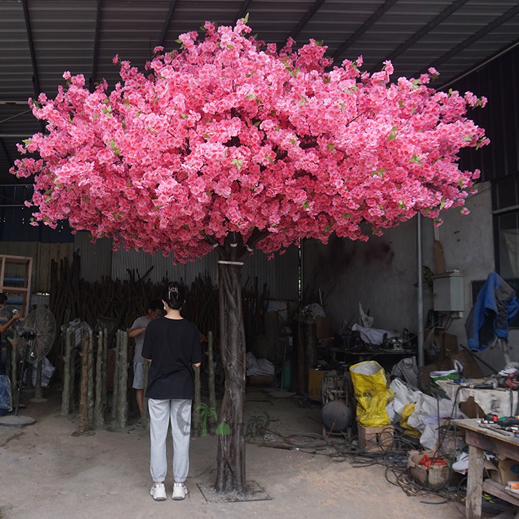 bold artificial bespoke flower tree used for brand activation in retail design