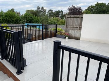sleek black balustrades for raised patios